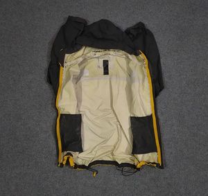 THE NORTH FACE YELLOW AND BLACK JACKET