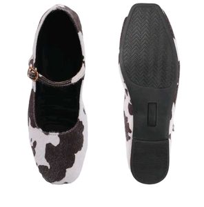 pair of multicoloured Mary Janes