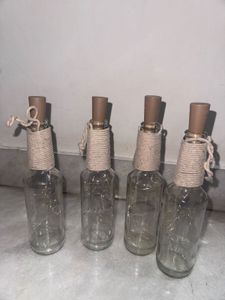 4 Glass bottles with Fairy lights