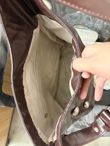 Chic Brown Leather Shoulder Bag with Silver Studs