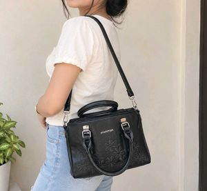 Chic Black Embossed Flower Handbag