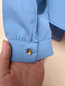 Blue Ruffled Button-Up Shirt