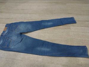 Distressed Blue Denim Jeans