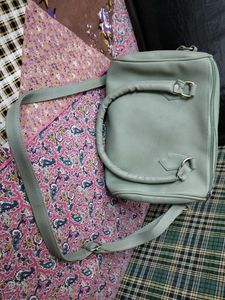 Stylish Light Green Handbag with Charm