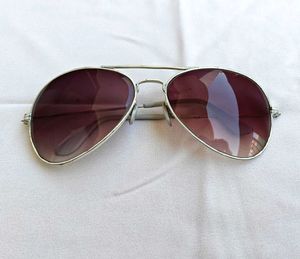 White Rimmed Sunglasses