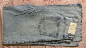 Light Wash Ripped Wide Leg Jeans