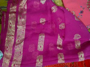 Vibrant Pink Saree with Gold Motifs