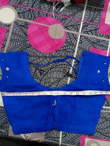Royal Blue Colour Blouse Dry Cleaned No Flaws Have Margin Of 1.5 Inches.