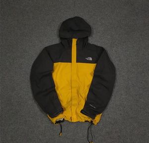 THE NORTH FACE YELLOW AND BLACK JACKET