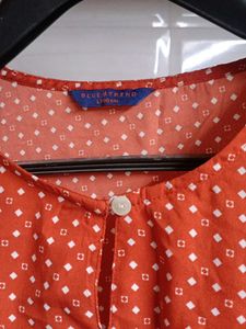 Chic Orange Polka Dot Top