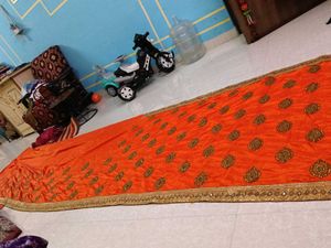 Vibrant Orange Embellished Lehenga Choli