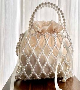 Elegant Pearl Embellished Clutch Bag
