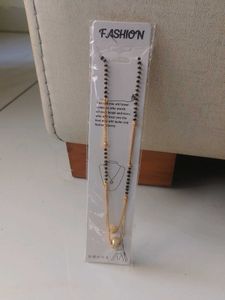 Elegant Gold & Black Beaded Necklace