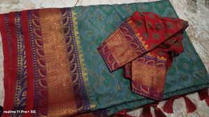 Exquisite Teal Saree with Red Blouse