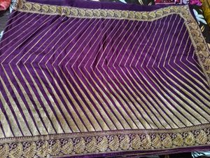 Elegant Purple Saree with Gold Stripes
