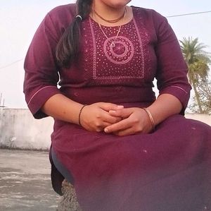 Elegant Maroon Kurta with Embellished Neckline