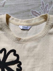 Cream T-Shirt with Black Flower Appliques