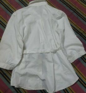 Chic White Peplum Top with Scarf Detail