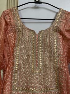 Beautiful Peach Suit with Intricate Work