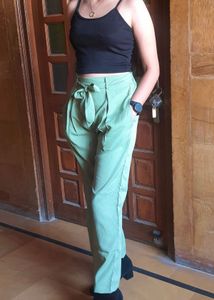High-Waisted Green Pants with black sleevl