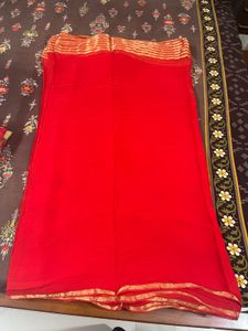 red golden saree