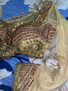 golden bridal type lehanga with blouse and duppata