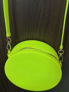 never used Neon Round Crossbody Bag