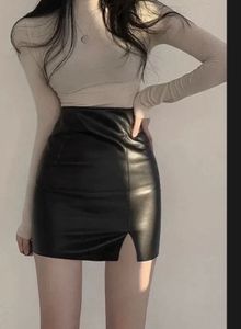 Black  Leather body hugging mini skirt
