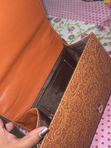 Elegant Embossed Clutch and sling bag