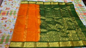 Vibrant Orange & Green Saree with Gold Border