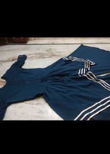 Elegant Teal Kurta Set with Decorative Trim