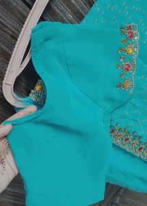 Stunning Embroidered Teal Saree