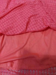 Elegant Coral Lace Gown with Embellished Neckline