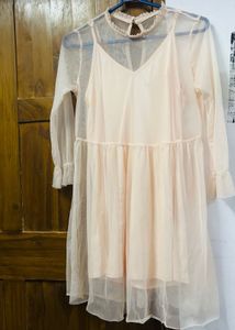 A net mini dress