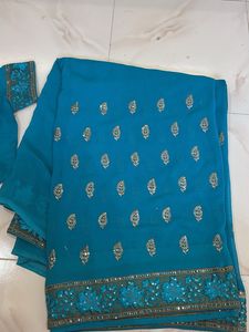 Beautiful Teal Saree with Embellishments