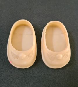 Off white shoes of a Doll from 1960s