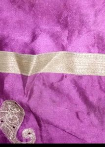 Shimmering Purple Fabric with Gold Trim