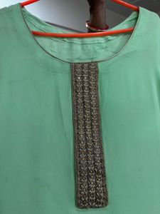 Elegant Mint Green Kurta with Embellished Neckline