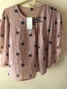 Chic Floral Print Top with Embellished Neckline