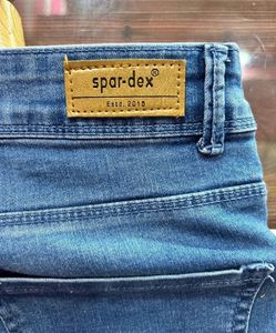Distressed Blue Denim Jeans