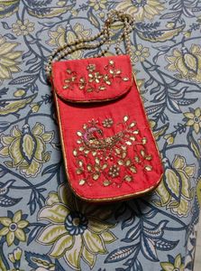 Embellished Red Clutch Bag mobile cover