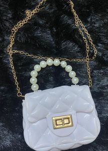Chic White Quilted Pearl Handle Clutch