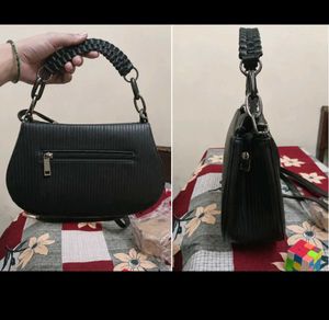 Chic Black Textured Handbag with Chain Strap
