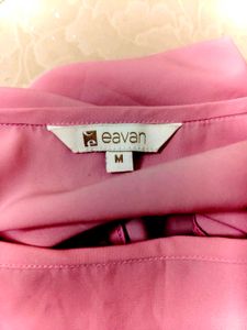 Chic Pink Midi Dress with Cutout Hem