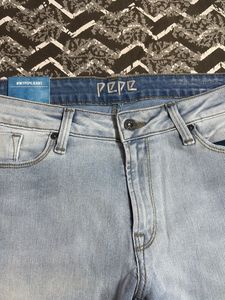 Light Wash Distressed Jeans