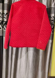 Red Jacket With Golden Chain .