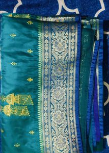Elegant Teal Embroidered Silk Saree
