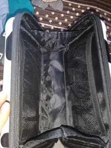 a sling bad in black or white colour