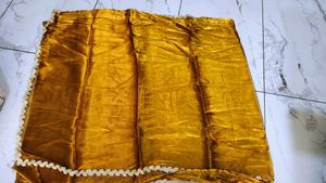 Orange Saree with Intricate Lace Border
