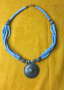 Bohemian Bone Beaded Necklace with Brass Pendant